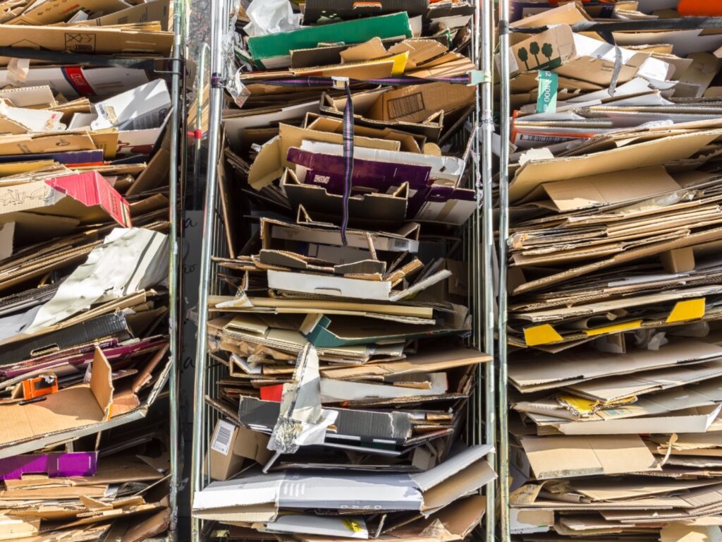 stack-of-paper-for-recycling-in-metal-containers-2025-03-08-17-33-41-utc